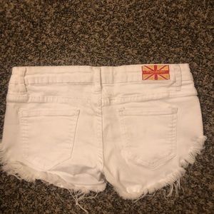 White distressed shorts